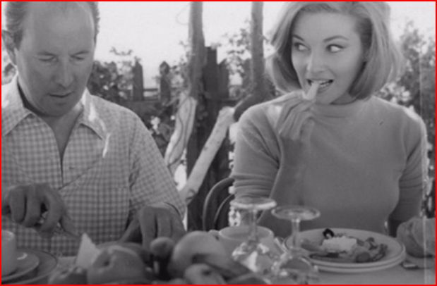 director Terence Young with Dan...